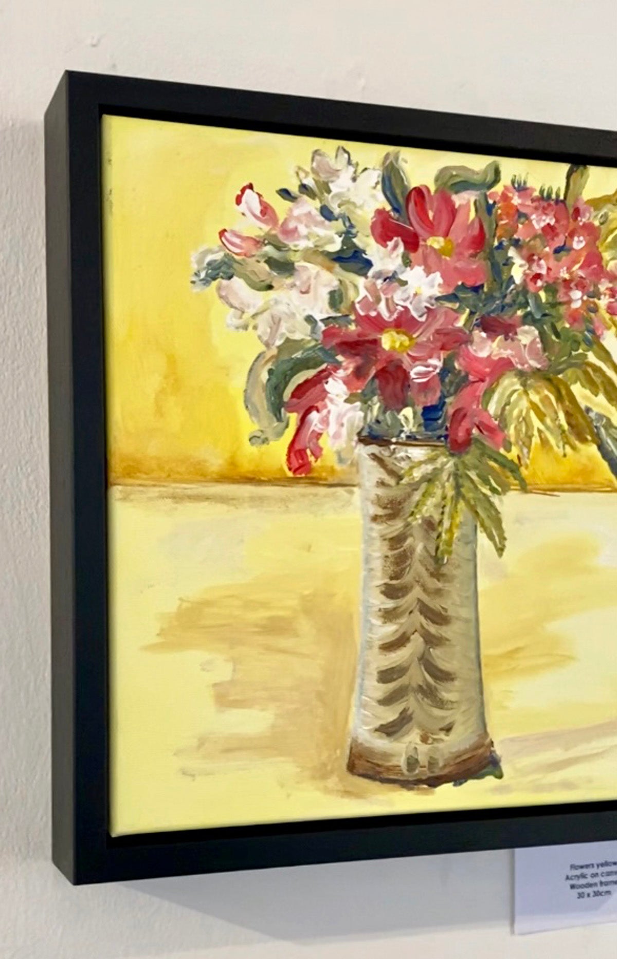 Fluffy and Free Flowers in studio pottery vase yellow background in frame